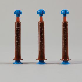 Comar Oral Dispensers with Tip Caps - Red Plunger
